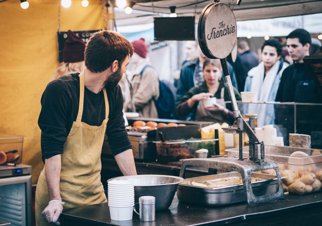 Customers at french fry stand